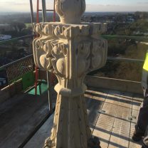 Image showing completed stone finial on top of the pinnacle