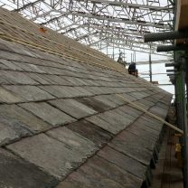 Image showing initial slates being laid on the roof of the church