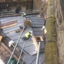 Image showing lead workers laying new lead roof