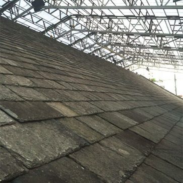 Image showing roof slates below scaffold covering