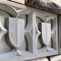 Image showing the newly carved and installed Parapet stones up close and in detail