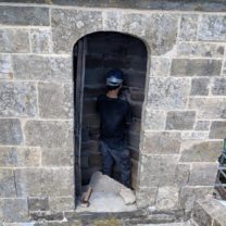 Image showing the new stonework being installed on the spiral staircase leading up to the Nave Roo