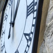 Image showing the restored clock face secured with new surrounds and fixings