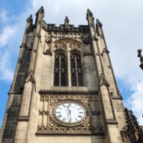 Image looking up at the Tower showing he completed Clock Face and new Louvres