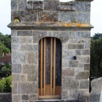 Image of the restored Turret door and surrounding masonry and repointing