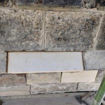 Image showing a new piece of stone to fit into the existing stringcourse to help prevent any rainwater damage to the stonework below