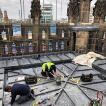 Image showing the final touches to the new Lead roof of the Tower prior to the Composite decking being laid