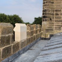 Image showing one new Battlement stone in a row of existing ones