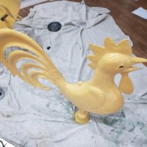 Image showing the repainting process of the Weathervane removed from the top of the Tower