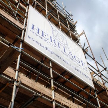 Heritage signage on the scaffold up the Spire at Christ Church