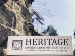 Heritage CR sign in front of the temporary roof scaffold